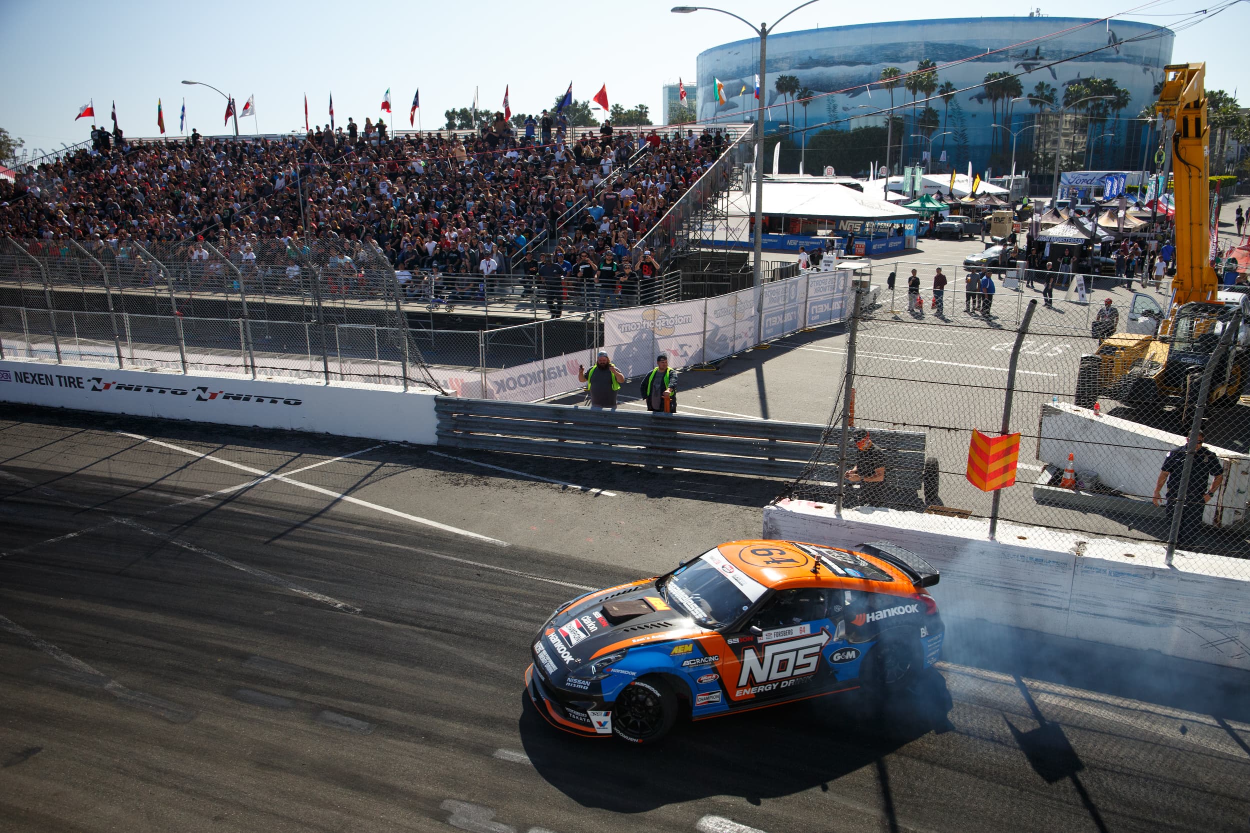 Forsberg Racing track action with crowd